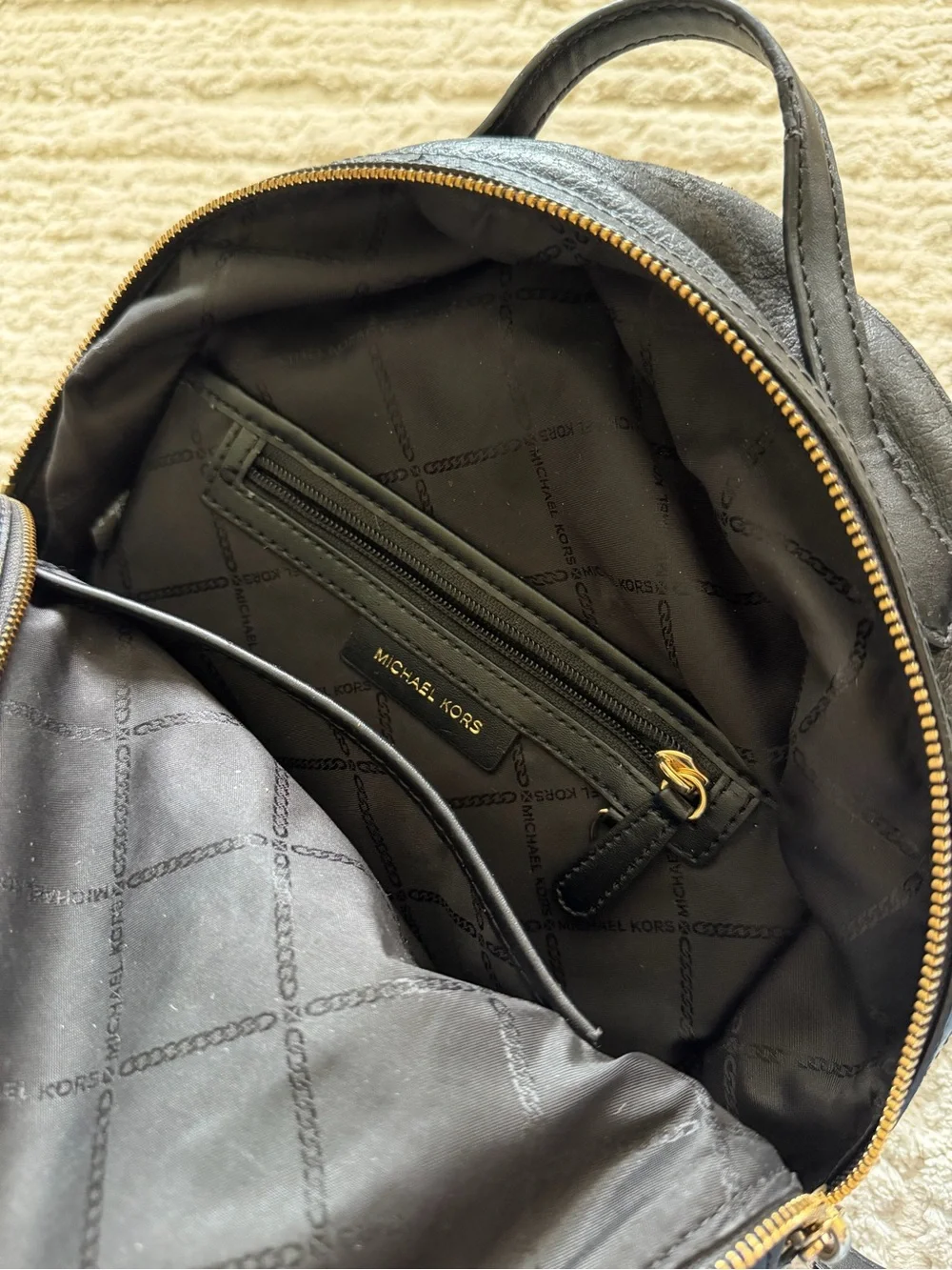 Michael Kors Black Pebbled Leather Backpack with Gold Accents